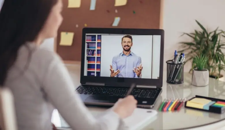 Young student watching lesson online and studying from home picture id1218990706